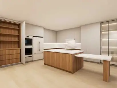 White kitchen with a white oak island, built-in ovens and a lit glass-front cabinet